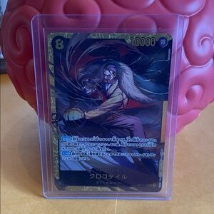 One Piece - 14 Crocodile Trading Card in Protective Sleeve